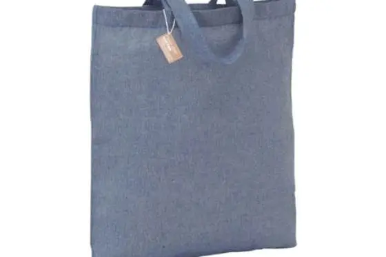 close-up of cotton twill fabric swatches and tote bags