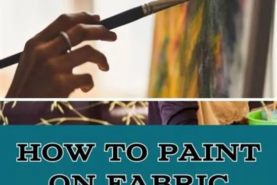 Iron pressing painted cotton fabric with parchment paper on ironing board