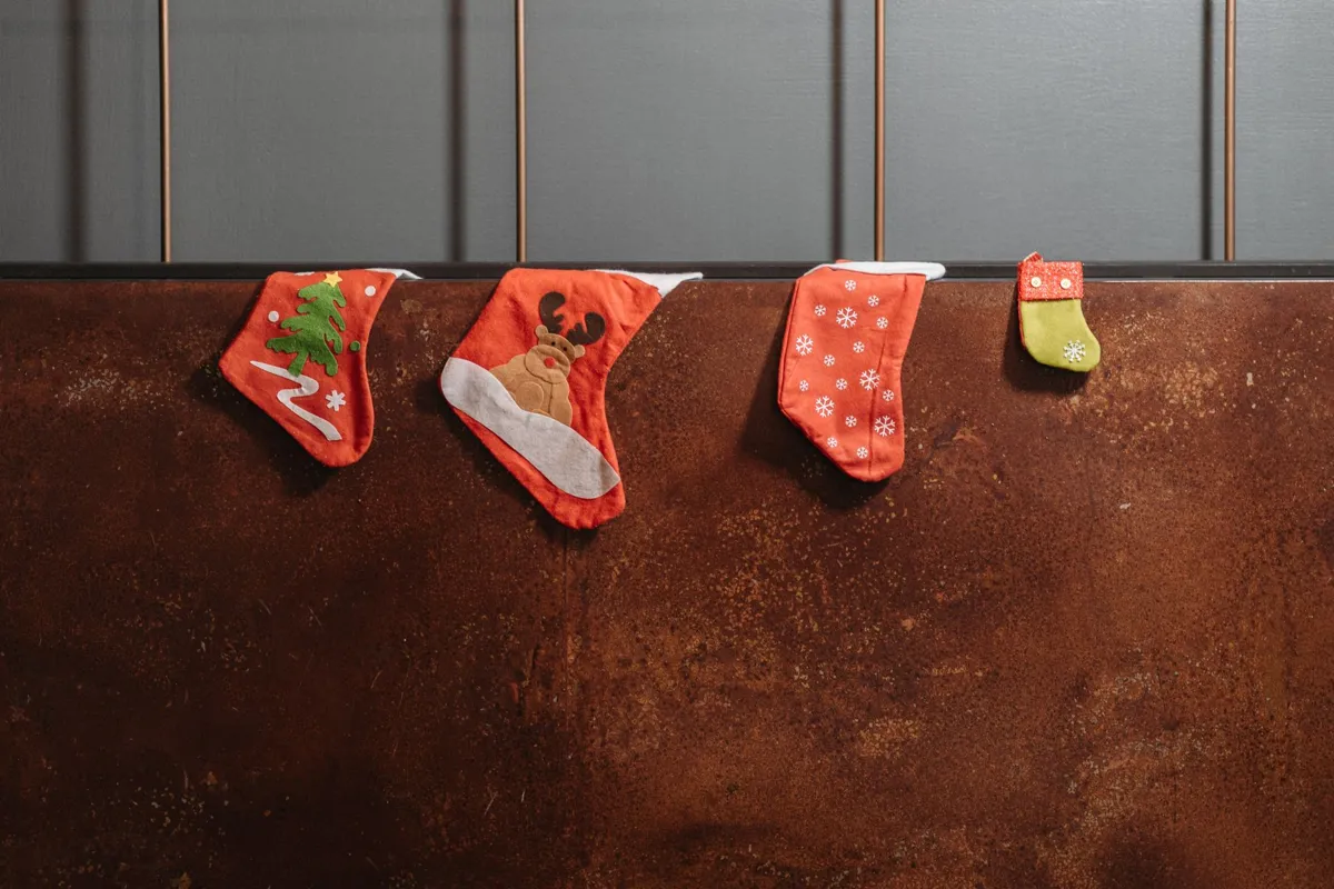 Christmas stockings hanging on a mantel