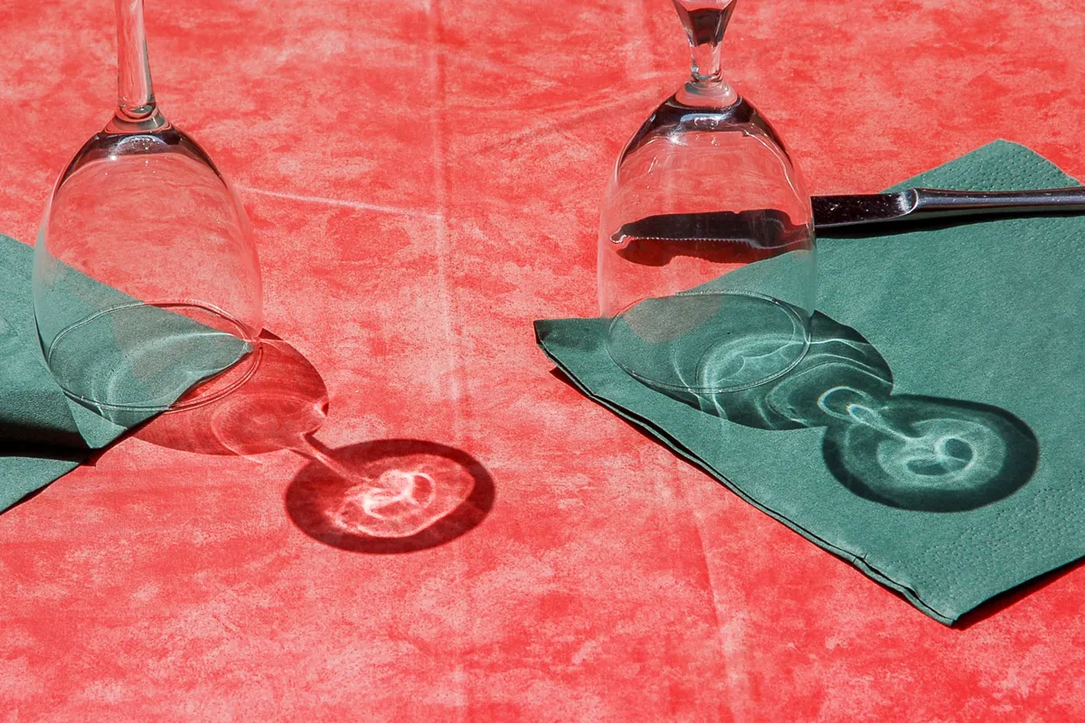 Folded cloth napkins on a set table