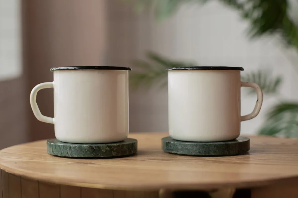 Handmade fabric coasters under mugs