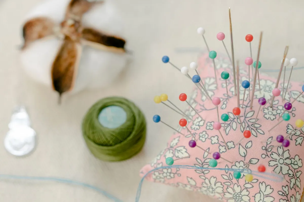Pin cushion with sewing pins