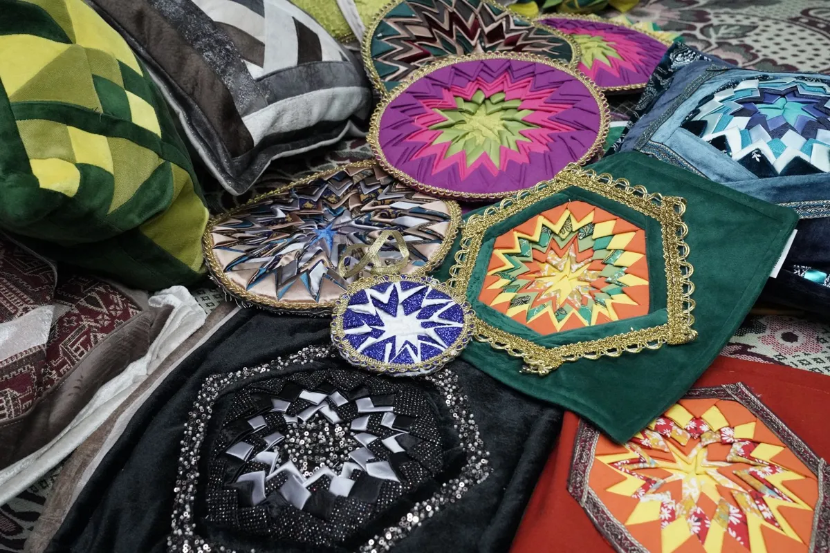 Quilt blocks laid out on a table